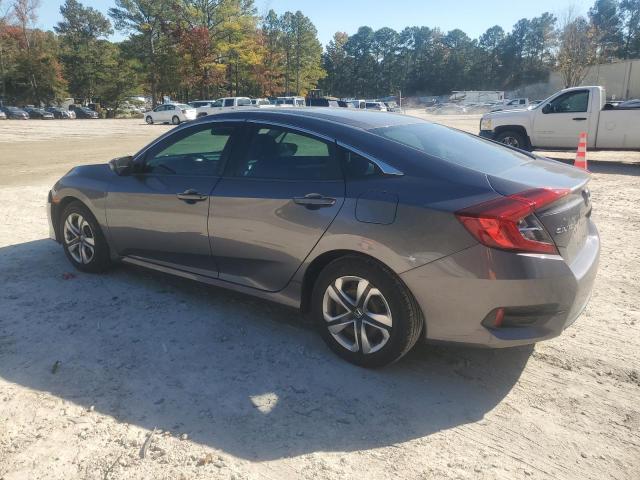 Photo 2 from auction – 2018 HONDA CIVIC LX with VIN 2HGFC2F54JH596356