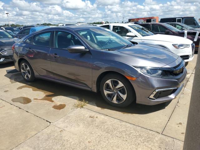 Photo 4 from auction – 2021 HONDA CIVIC LX with VIN 2HGFC2F64MH535408