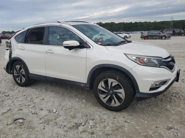 Photo 4 from auction – 2015 HONDA CR-V TOURI with VIN 5J6RM4H99FL033697
