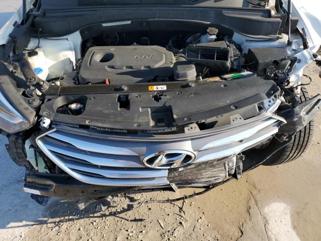 Photo 12 from auction – 2018 HYUNDAI SANTA FE S with VIN 5NMZU3LB0JH083554
