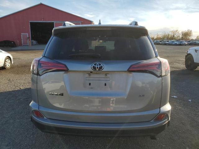 Photo 6 from auction – 2018 TOYOTA RAV4 LE with VIN 2T3ZFREV0JW486448