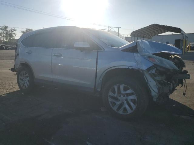 Photo 4 from auction – 2015 HONDA CR-V EX with VIN 3CZRM3H54FG710059