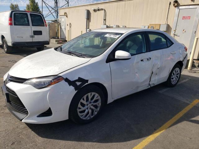 TOYOTA COROLLA L 2018 with VIN 5YFBURHE4JP802270 - Photo from auction