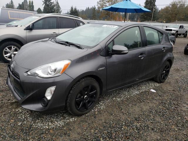 TOYOTA PRIUS C 2015 with VIN JTDKDTB33F1097915 - Photo from auction