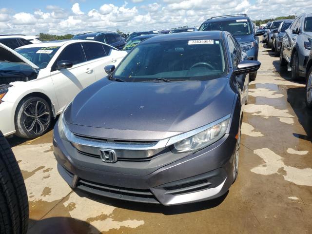 Photo 5 from auction – 2018 HONDA CIVIC LX with VIN 19XFC2F56JE033738