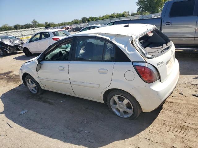 Photo 2 from auction – 2011 KIA RIO BASE with VIN KNADH5A39B6755340
