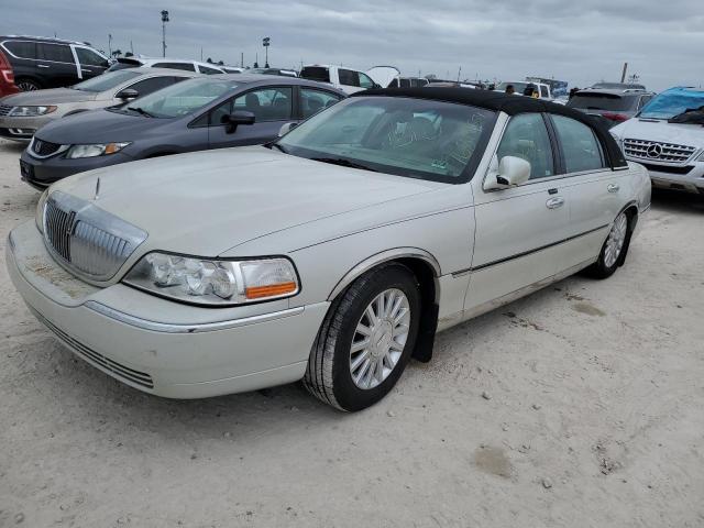 LINCOLN TOWN CAR E 2004 with VIN 1LNHM81W94Y677804 - Photo from auction