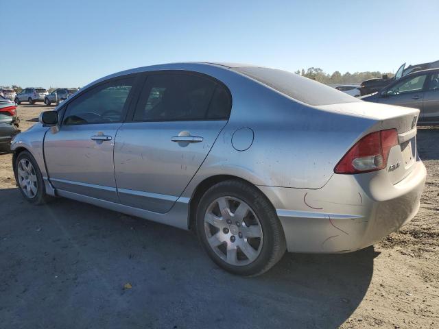 Photo 2 from auction – 2010 HONDA CIVIC LX with VIN 19XFA1F52AE077574