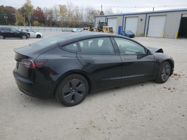 Снимка 3 от търг – 2023 TESLA MODEL 3 с VIN 5YJ3E1EA5PF564518
