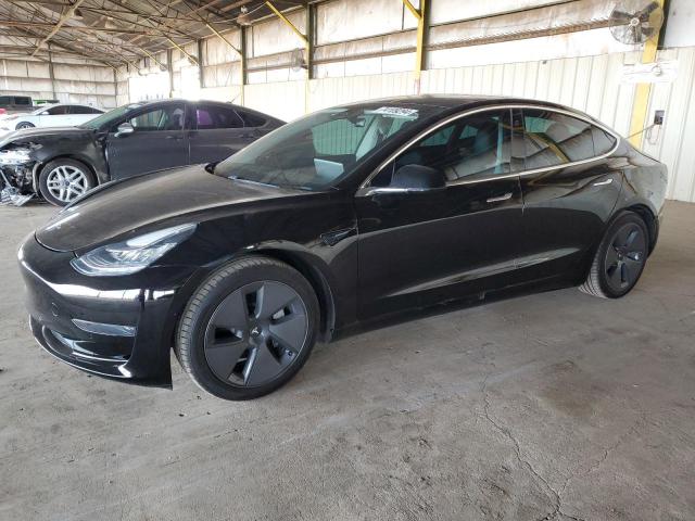 TESLA MODEL 3 2020 with VIN 5YJ3E1EAXLF704606 - Photo from auction