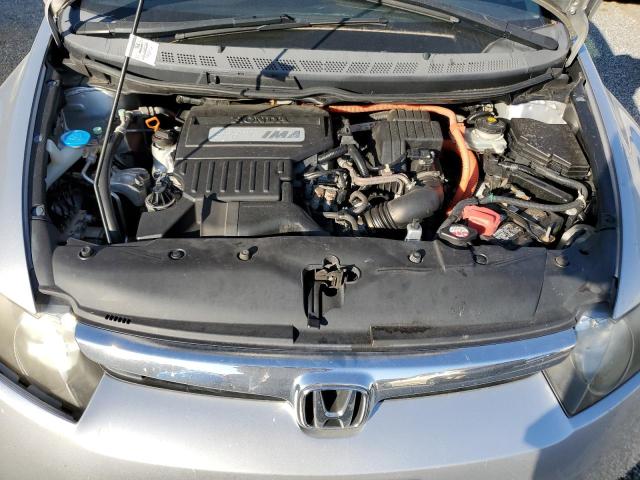 Photo 12 from auction – 2006 HONDA CIVIC HYBR with VIN JHMFA362X6S005400