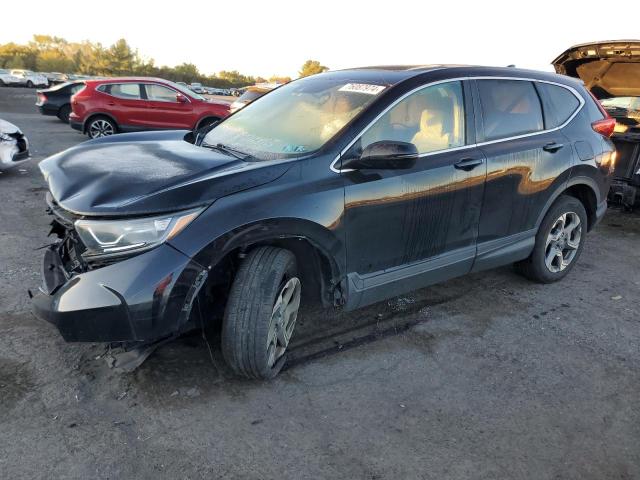 HONDA CR-V EX 2018 with VIN 2HKRW2H53JH675086 - Photo from auction