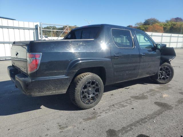 Фото 3 с аукциона – 2014 HONDA RIDGELINE с VIN 5FPYK1F52EB005562