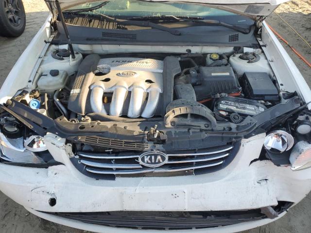 Photo 11 from auction – 2006 KIA OPTIMA LX with VIN KNAGE123965030913