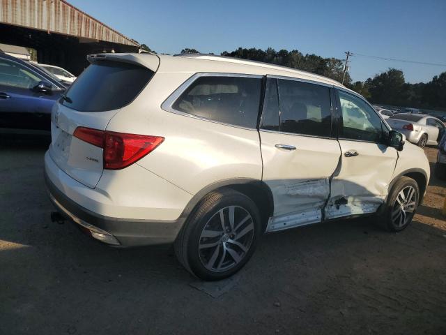 Photo 3 from auction – 2018 HONDA PILOT TOUR with VIN 5FNYF5H99JB002527
