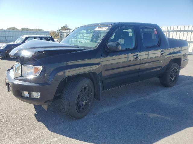 HONDA RIDGELINE 2014 with VIN 5FPYK1F52EB005562 - Photo from auction