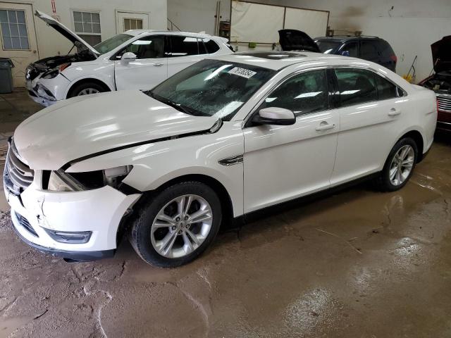 FORD TAURUS SEL 2014 with VIN 1FAHP2E81EG100363 - Photo from auction