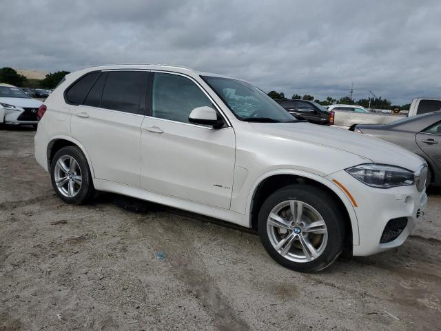 Photo 4 from auction – 2017 BMW X5 XDRIVE5 with VIN 5UXKR6C55H0J84208