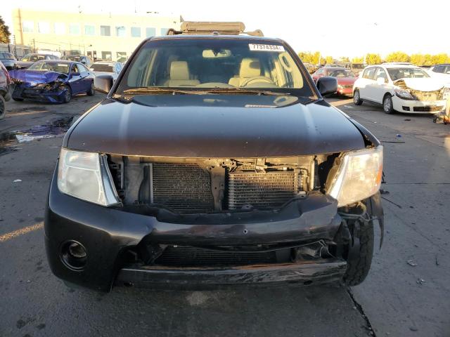 Photo 5 from auction – 2011 NISSAN PATHFINDER with VIN 5N1AR1NB2BC608514