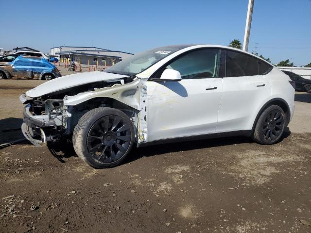 TESLA MODEL Y 2023 with VIN 7SAYGDEE5PA104991 - Photo from auction
