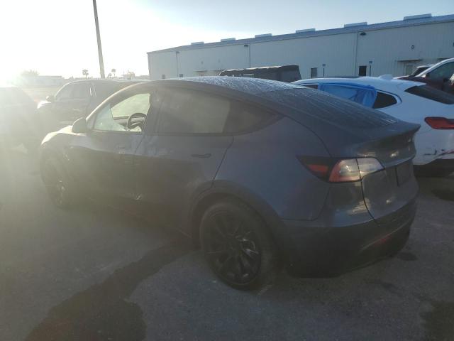 Photo 2 from auction – 2023 TESLA MODEL Y with VIN 7SAYGDED4PF949129