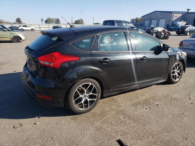 Foto 3 de la subasta – 2015 FORD FOCUS SE con VIN 1FADP3K26FL211052