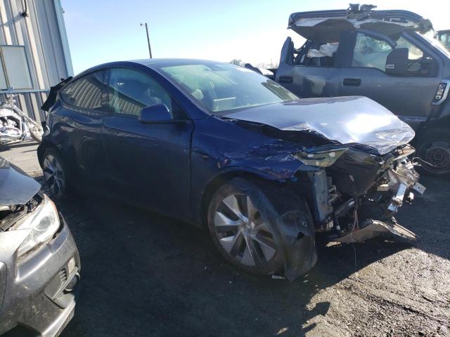 Photo 4 from auction – 2023 TESLA MODEL Y with VIN 7SAYGDEE5PF684908