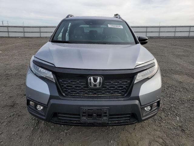 Photo 5 from auction – 2021 HONDA PASSPORT E with VIN 5FNYF8H03MB021114