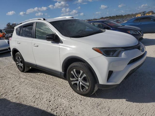 Photo 4 from auction – 2016 TOYOTA RAV4 LE with VIN JTMZFREV3GJ067436