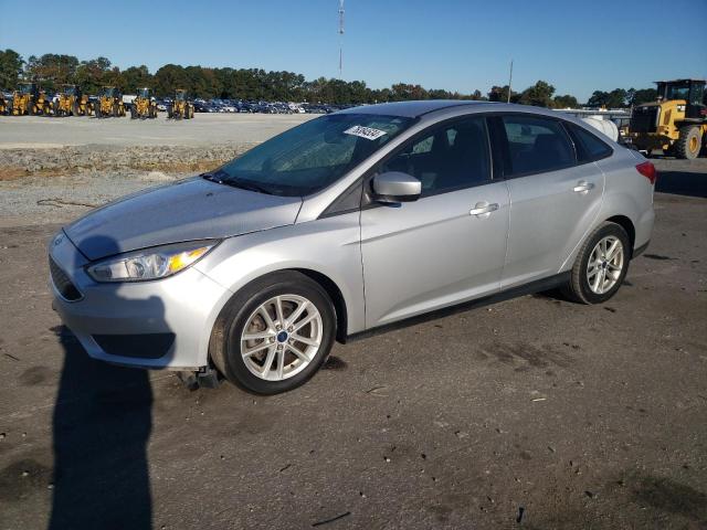FORD FOCUS SE 2018 with VIN 1FADP3F23JL250457 - Photo from auction