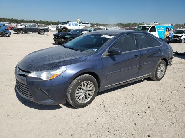 TOYOTA CAMRY LE 2017 with VIN 4T1BF1FKXHU698087 - Photo from auction