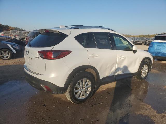 Photo 3 from auction – 2014 MAZDA CX-5 TOURI with VIN JM3KE4CY6E0351318