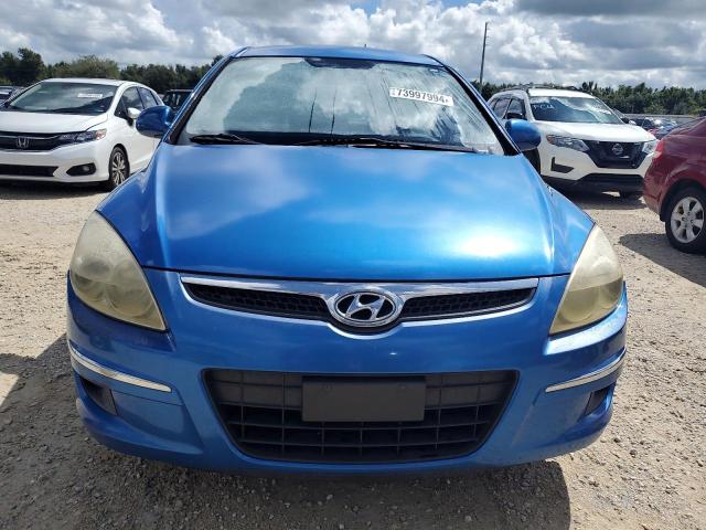 Photo 5 from auction – 2011 HYUNDAI ELANTRA TO with VIN KMHDB8AE9BU106944