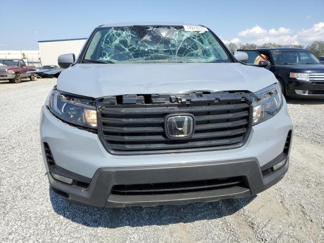 Photo 5 from auction – 2023 HONDA RIDGELINE with VIN 5FPYK3F52PB065274
