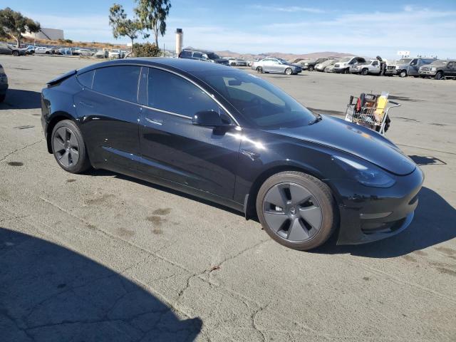 Photo 4 from auction – 2021 TESLA MODEL 3 with VIN 5YJ3E1EBXMF088495