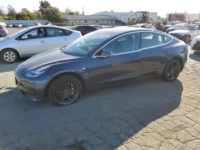 TESLA MODEL 3 2018 with VIN 5YJ3E1EB5JF128767 - Photo from auction