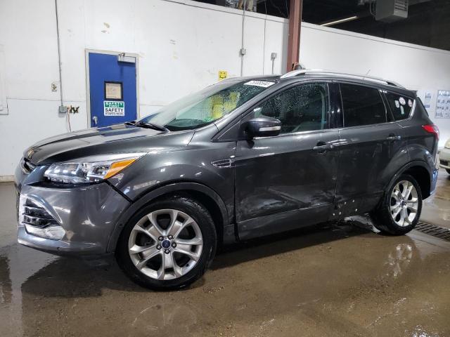 FORD ESCAPE TIT 2016 with VIN 1FMCU9JX4GUB95262 - Photo from auction