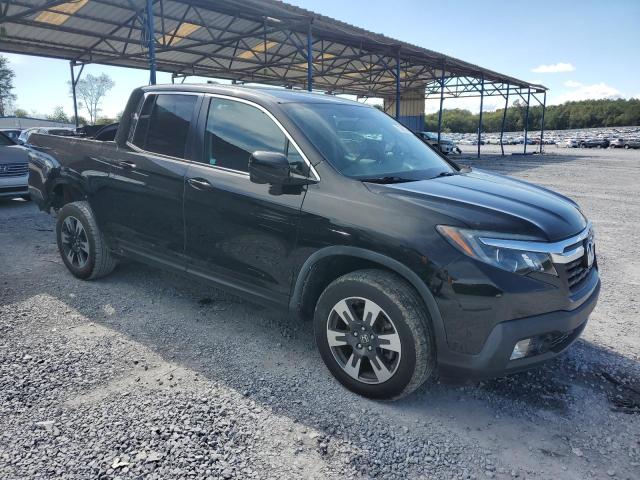 Photo 4 from auction – 2018 HONDA RIDGELINE with VIN 5FPYK3F68JB015270