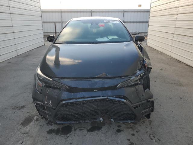 Photo 5 from auction – 2021 TOYOTA COROLLA SE with VIN 5YFS4MCE1MP064734