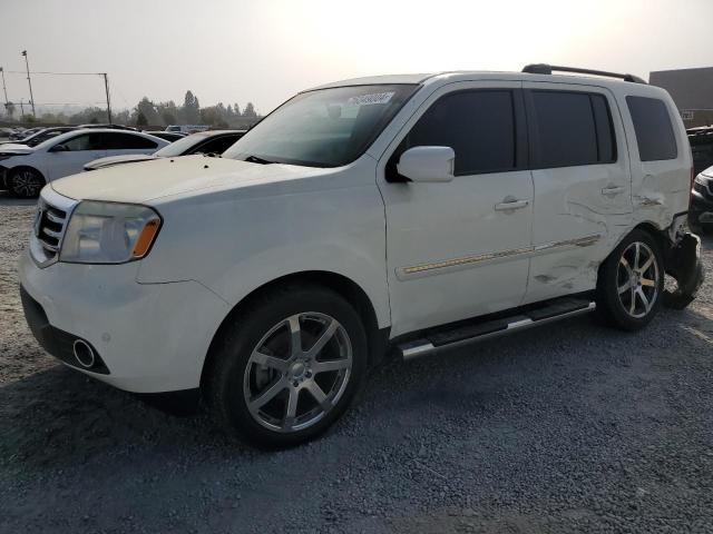 HONDA PILOT TOUR 2013 with VIN 5FNYF3H99DB030658 - Photo from auction