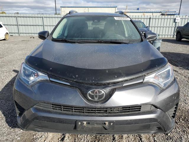 Photo 5 from auction – 2018 TOYOTA RAV4 LE with VIN 2T3ZFREV6JW438579