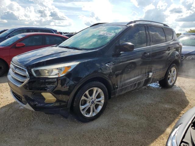 FORD ESCAPE SE 2018 with VIN 1FMCU0GD8JUC55298 - Photo from auction