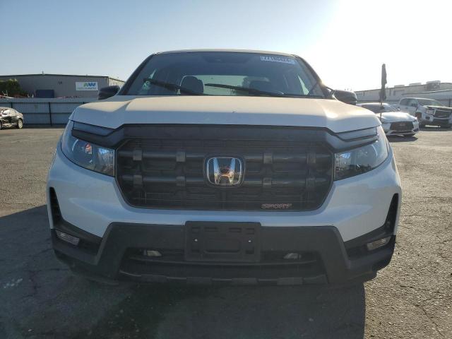 Photo 5 from auction – 2024 HONDA RIDGELINE with VIN 5FPYK3F19RB008859