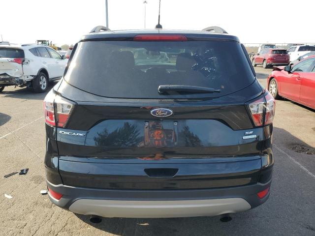 Photo 6 from auction – 2018 FORD ESCAPE SE with VIN 1FMCU0GD6JUC00400