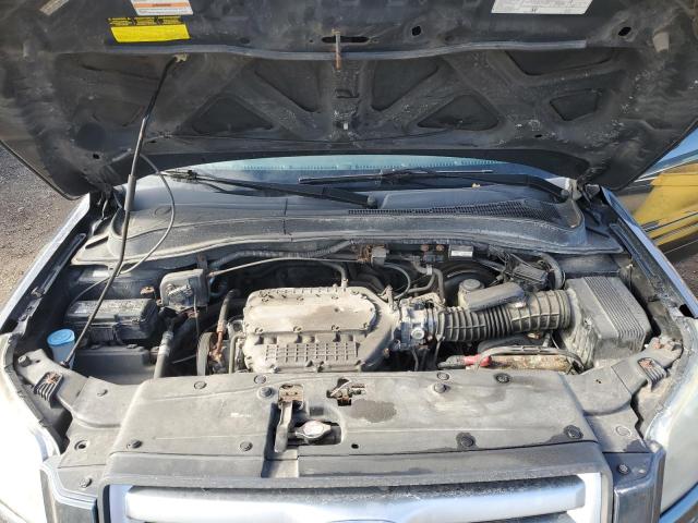 Photo 12 from auction – 2006 HONDA PILOT EX with VIN 2HKYF18576H548502