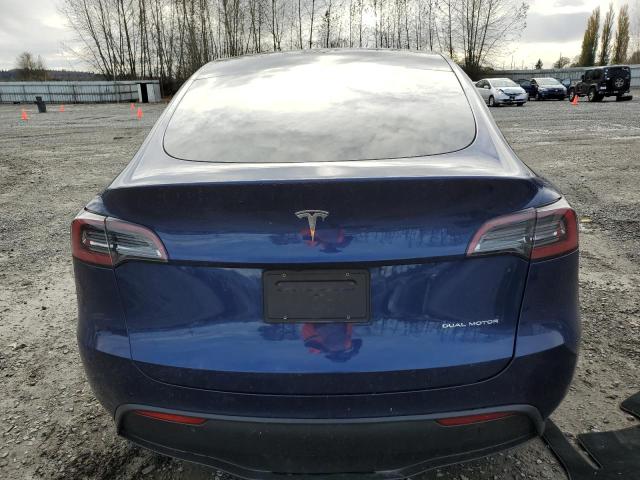 Photo 6 from auction – 2023 TESLA MODEL Y with VIN 7SAYGAEEXPF949238