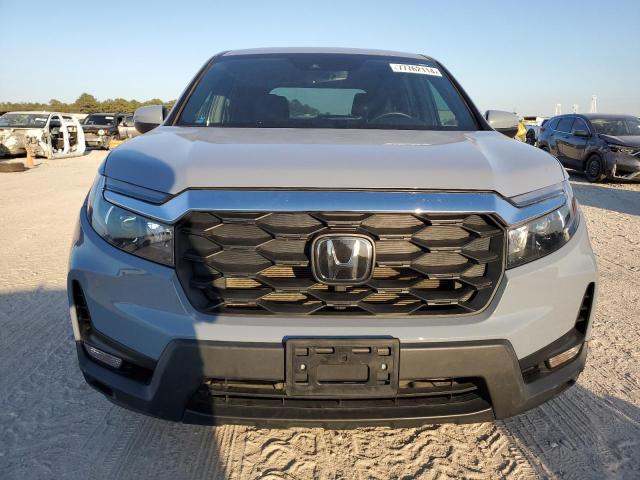 Photo 5 from auction – 2022 HONDA PASSPORT E with VIN 5FNYF8H53NB030280