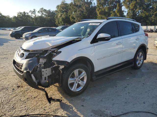 TOYOTA RAV4 XLE 2014 with VIN JTMWFREV2ED037925 - Photo from auction