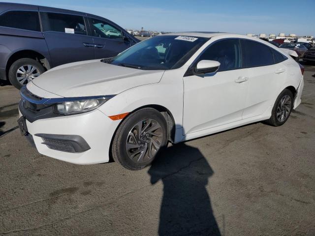 HONDA CIVIC EX 2018 with VIN 2HGFC2F79JH525915 - Photo from auction