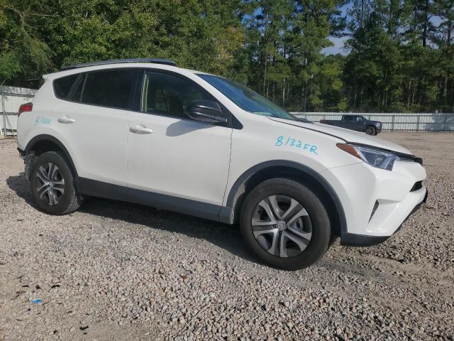 Photo 4 from auction – 2017 TOYOTA RAV4 LE with VIN JTMZFREV2HJ105059
